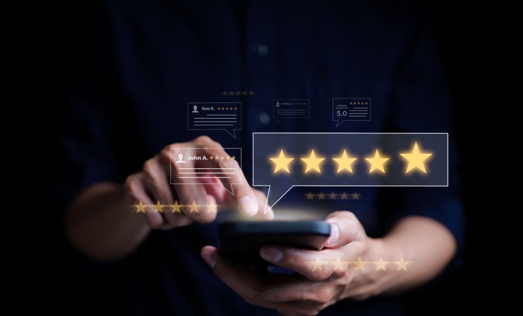 Person using a smartphone to give a five-star rating with holographic feedback display.